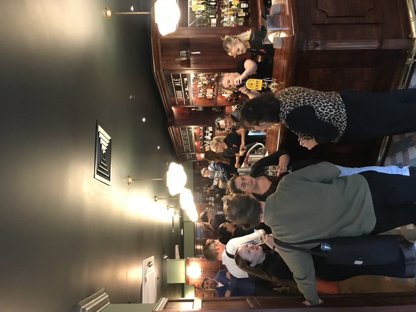 Guests gathered at the bar